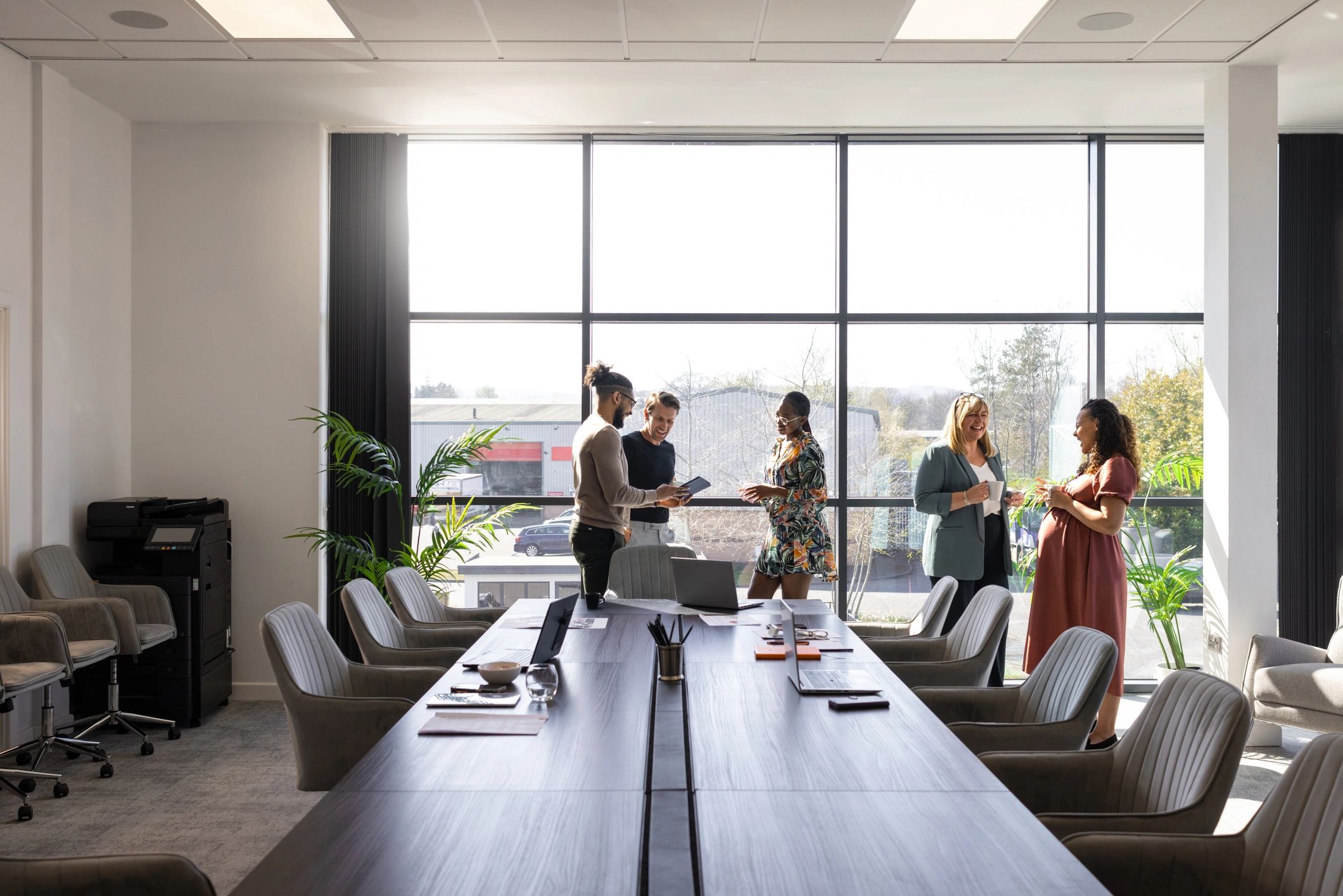 Financial services team collaborating in a modern office